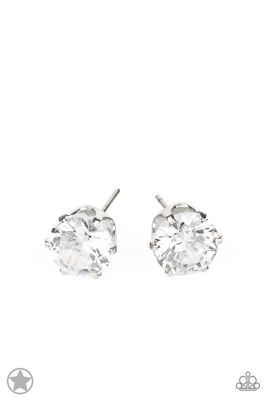 Paparazzi Accessories - A sparkling white rhinestone is nestled inside a classic silver frame for a timeless look. 