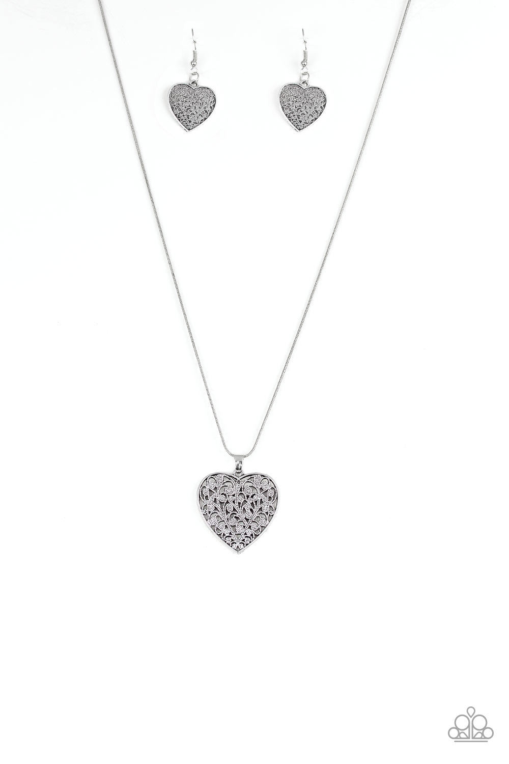 Paparazzi - Filled with vine-like filigree detail, a silver heart pendant swings below the collar for a vintage inspired look. Features an adjustable clasp closure.