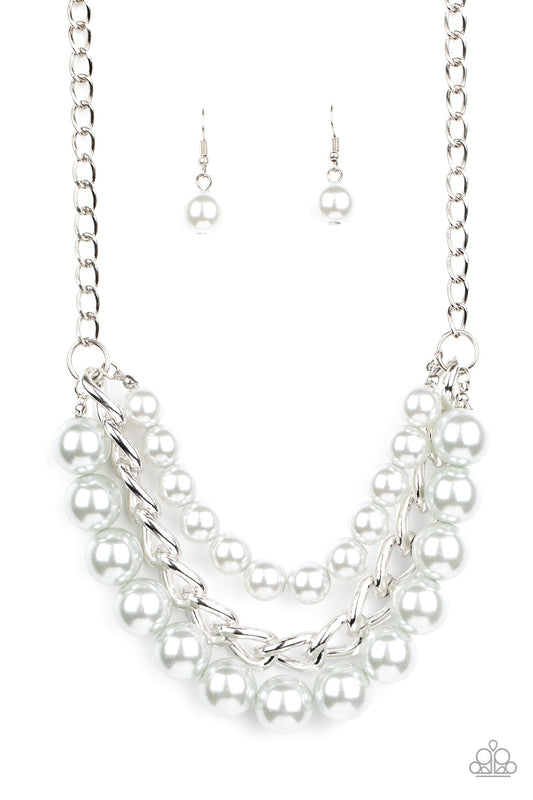 Two strands of dramatic silver pearls flank one strand of oversized silver chain, creating statement-making layers below the collar.  Paparazzi Accessories are nickel-free and lead free.