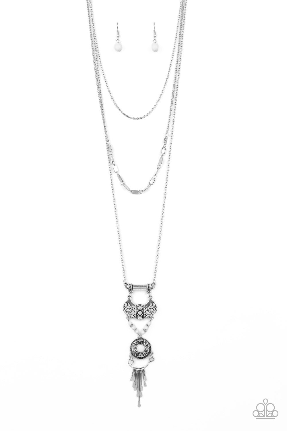 shimmery silver chains layer down with a BOHO styled charm at the bottom. Classy look for any occassion.