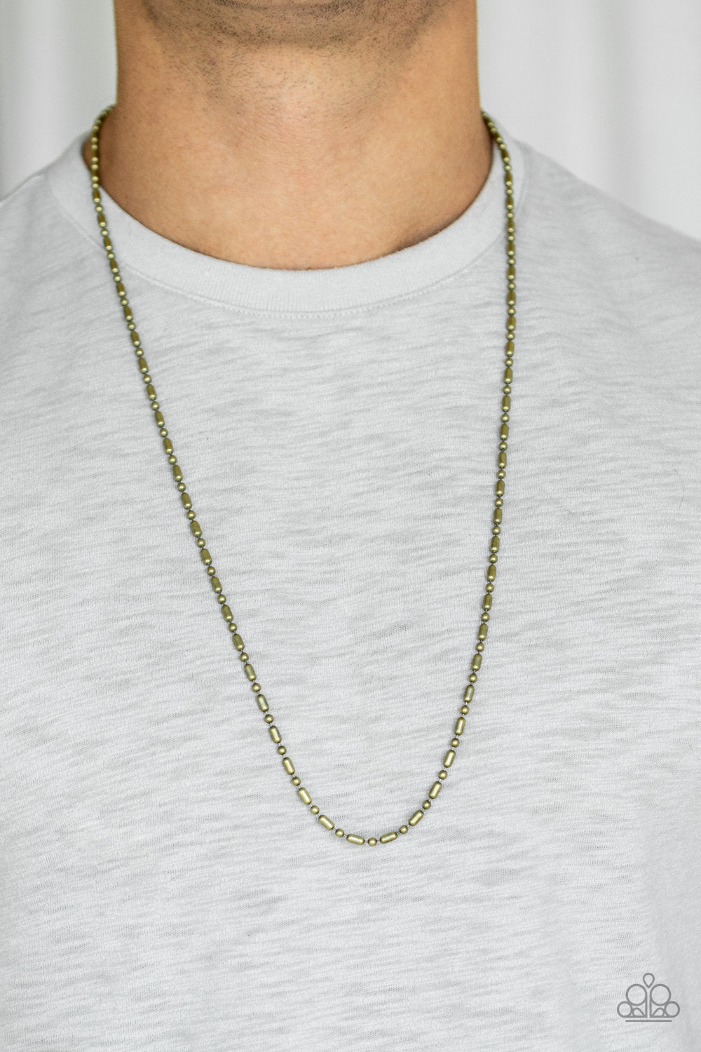 New Paparazzi Accessories - a dainty brass ball and bar chain drapes across the chest for a casual look.