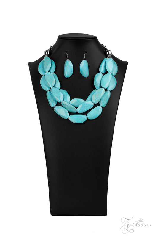 Three groundbreaking tiers of faceted turquoise stones and dainty silver beads layer down the chest.