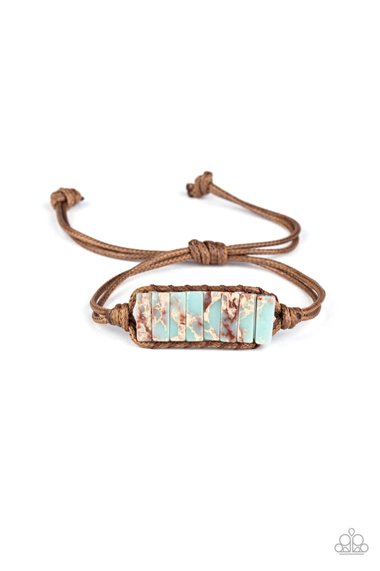 Paparazzi Bracelet-A multi-colored row of natural stones are knotted in place around the wrist with a piece of brown cording for an earthy look.