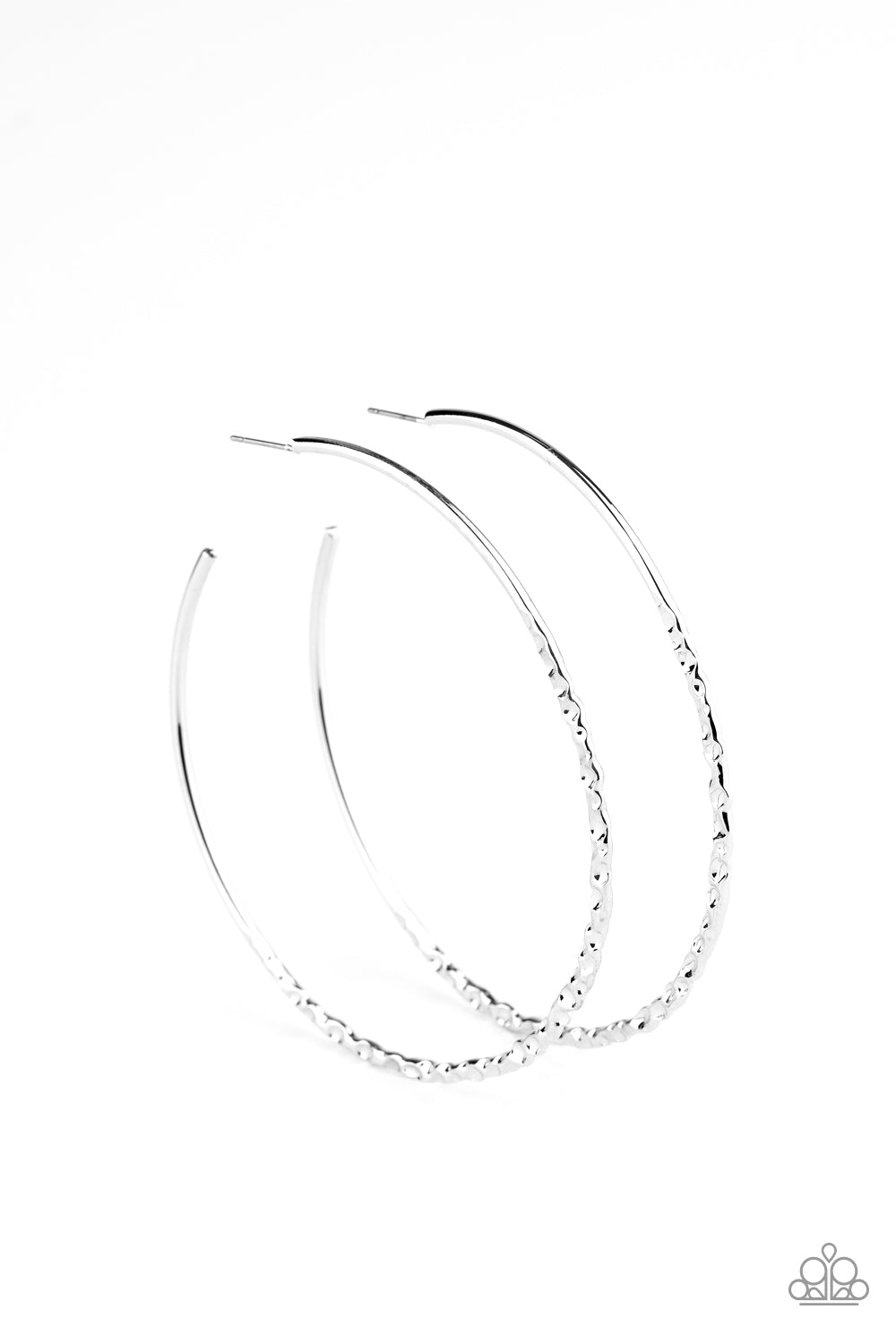 Paparazzi Accessories- The flattened bottom of an oversized silver hoop has been dramatically hammered in blinding texture for a bold industrial look.