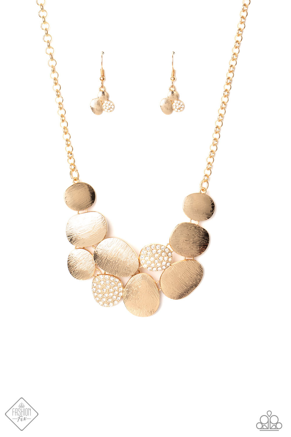 Gold necklace featuring a collection of asymmetrical oval discs connect into a clustered pendant below the collar for a refined flair.