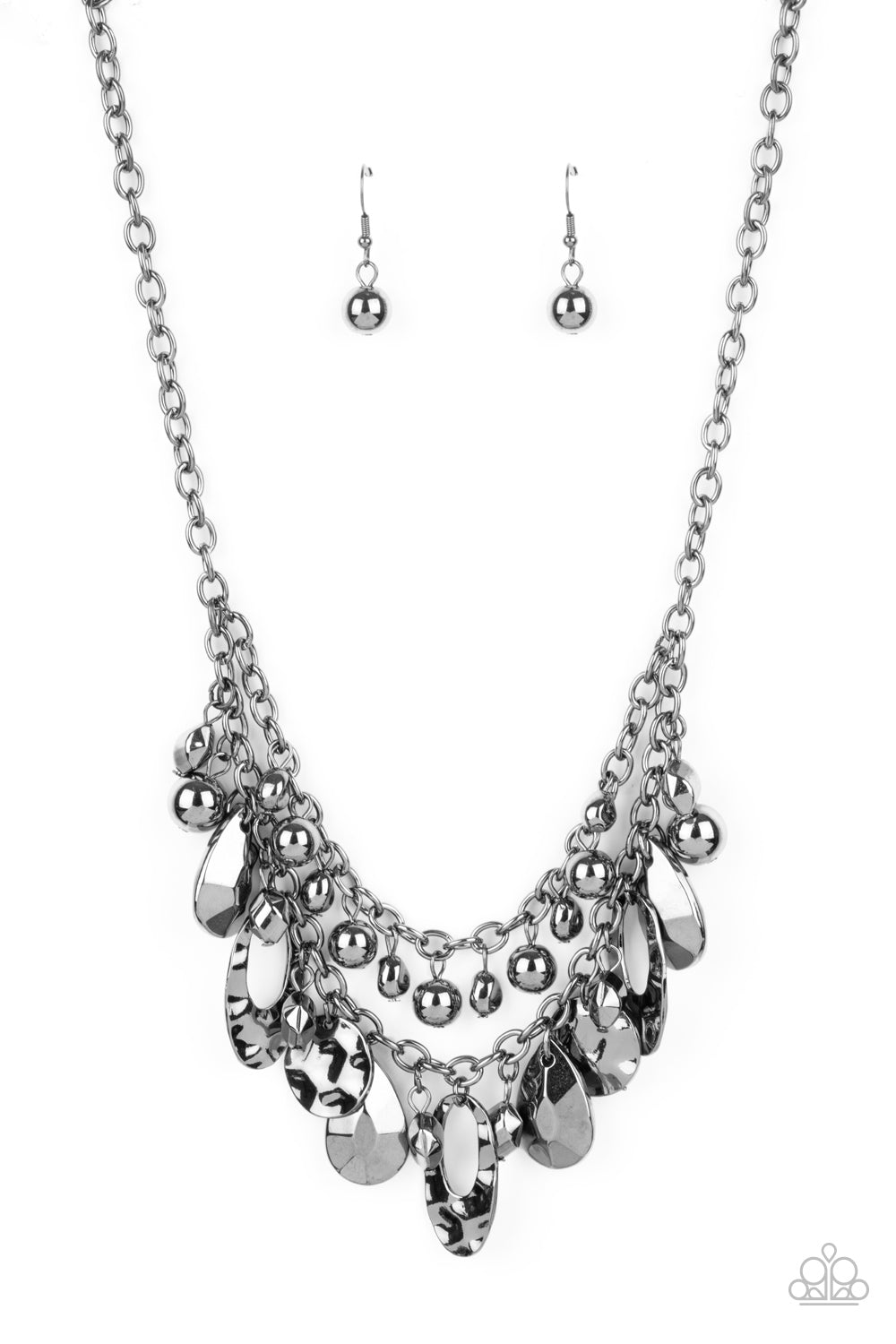 Infused with a row of classic gunmetal beads, an oversized collection of hammered gunmetal teardrops, discs, and faceted beads swing from a classic gunmetal chain, creating a rambunctious fringe below the collar