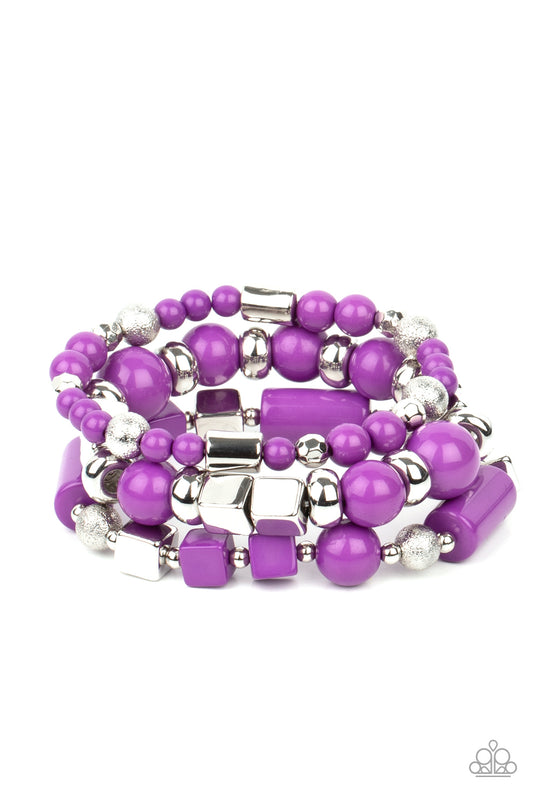 Paparazzi Accessories - Featuring round, cube, and faceted shapes, a colorful collection of purple and silver beads are threaded along stretchy bands around the wrist, 