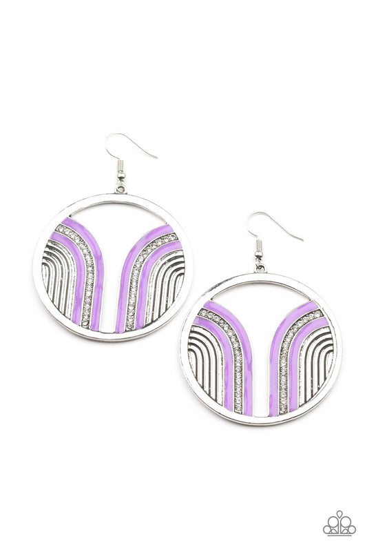 Infused with a glittery row of white rhinestones, shiny purple arcs curve into juxtaposed frames inside a classic silver hoop, creating a colorful art deco inspired centerpiece.