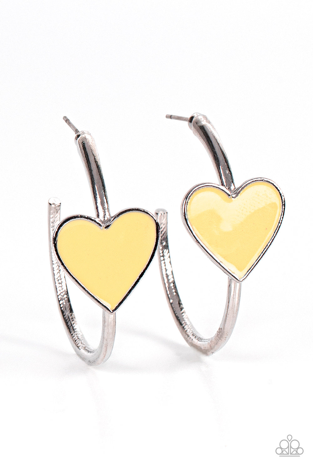 A charming Illuminating heart adorns the front of a classic silver hoop resulting in a whimsical fashion. Earring attaches to a standard post fitting. Hoop measures approximately 1 1/4" in diameter.