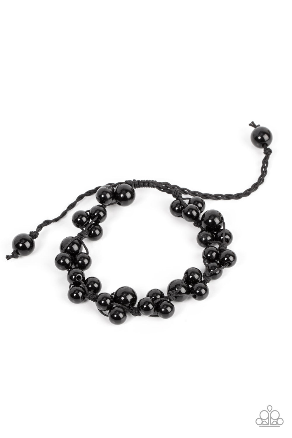Bubbly clusters of black beads are decoratively knotted around the wrist, adding a timeless twist to the classic centerpiece. Features an adjustable sliding knot closure.