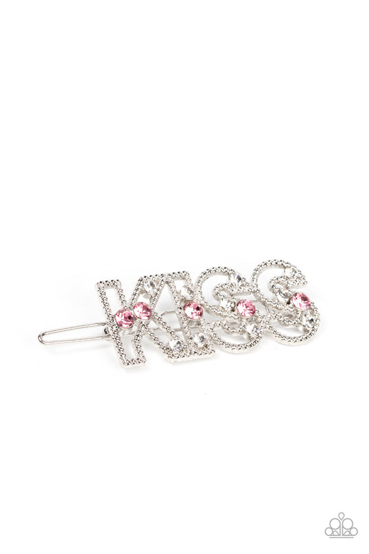 Glassy white and sparkly pink rhinestones are sprinkled across the front of airy silver frames that spell out, "Kiss" for a flirtatious finish. Features a clamp barrette closure.