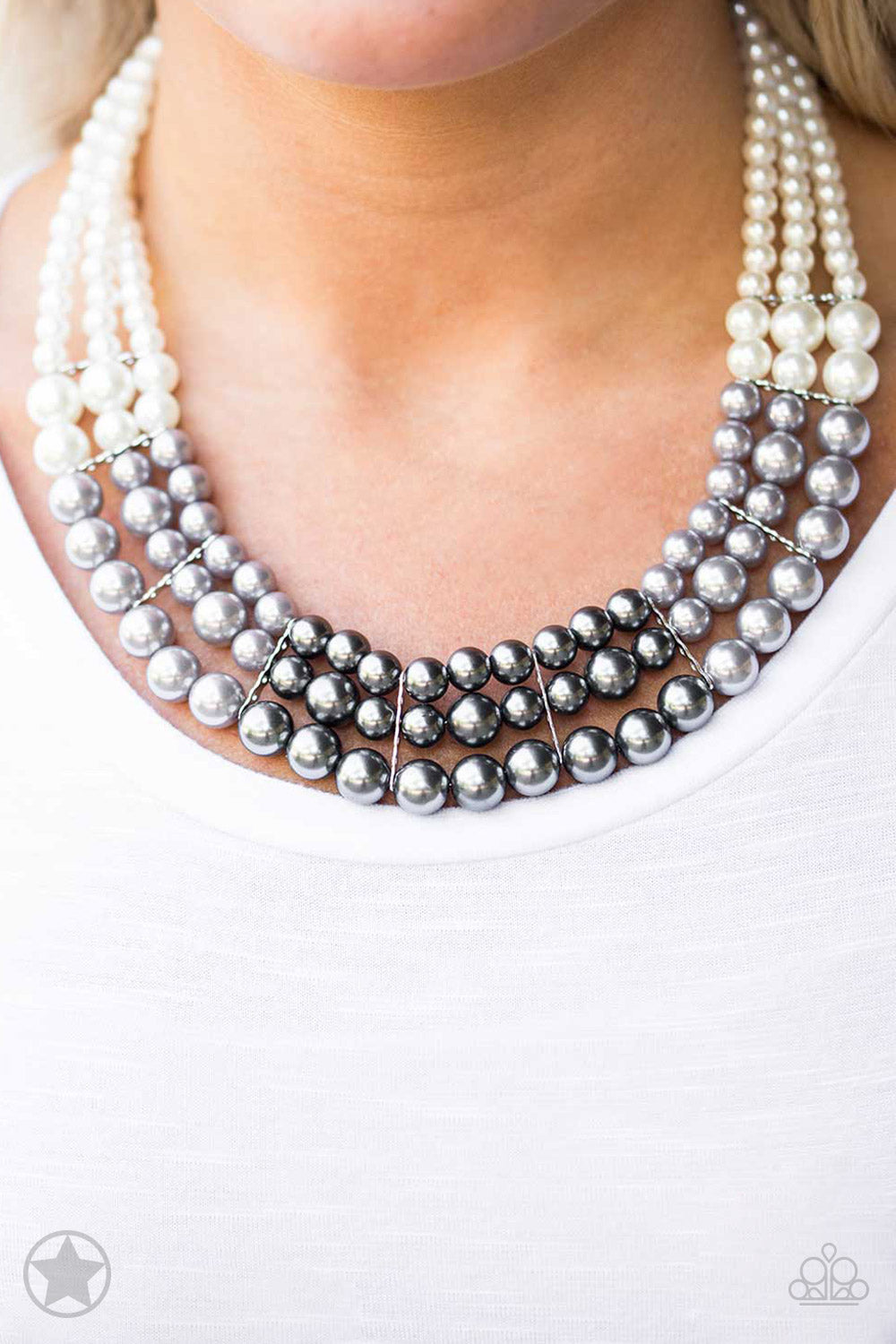 Paparazzi Pearl Necklace with beautiful white, silver and grey pearls throughout. Peeks of bling shining throughout.