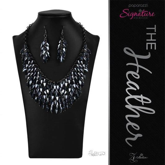 Paparazzi Accessories - The Zi Collection Necklace A Row after row of metallic blue beads swing from an edgy net of glistening gunmetal links, layering into an edgy fringe below the collar. 